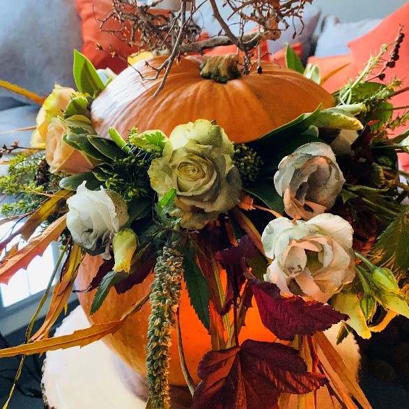 halloween flower arrangement in pumpkin